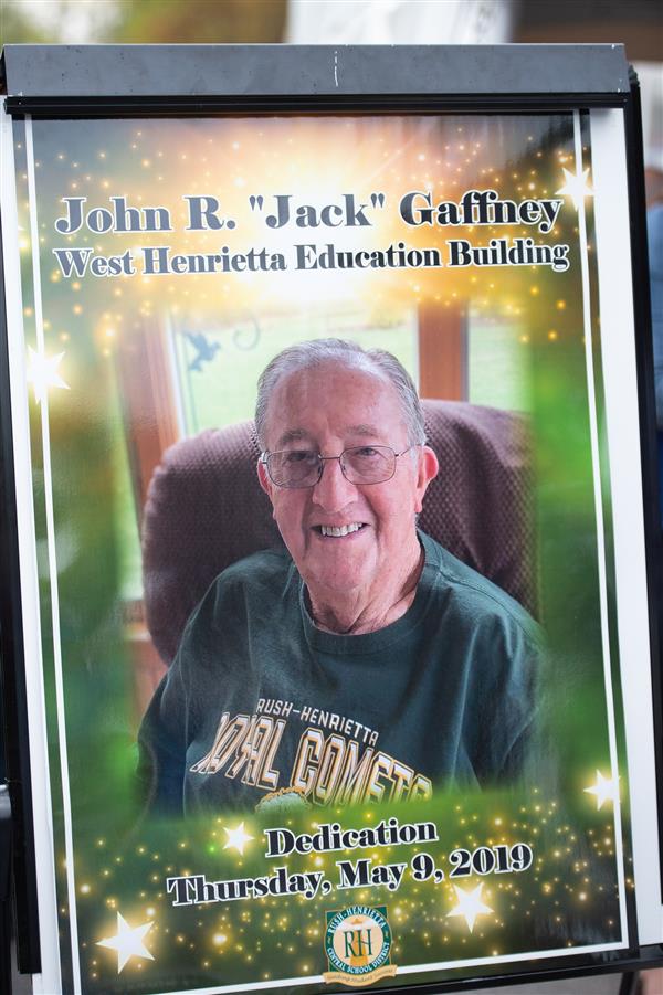 A photo of the sign for the dedication event with Jack's picture on it.